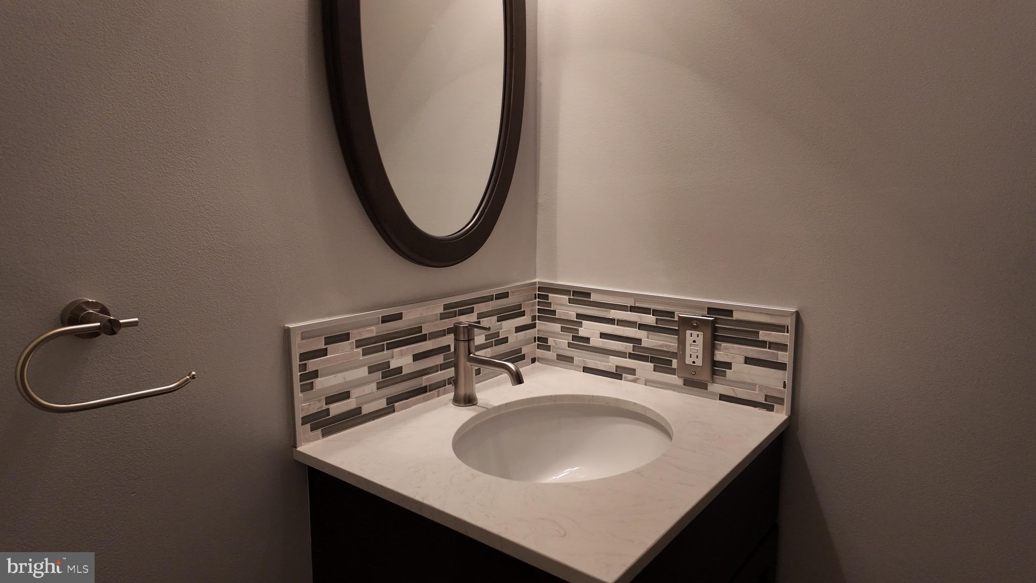 1185 Kesler Road Front Royal, VA 22630 - Photo 31 of 51 a bathroom with a sink and a mirror
