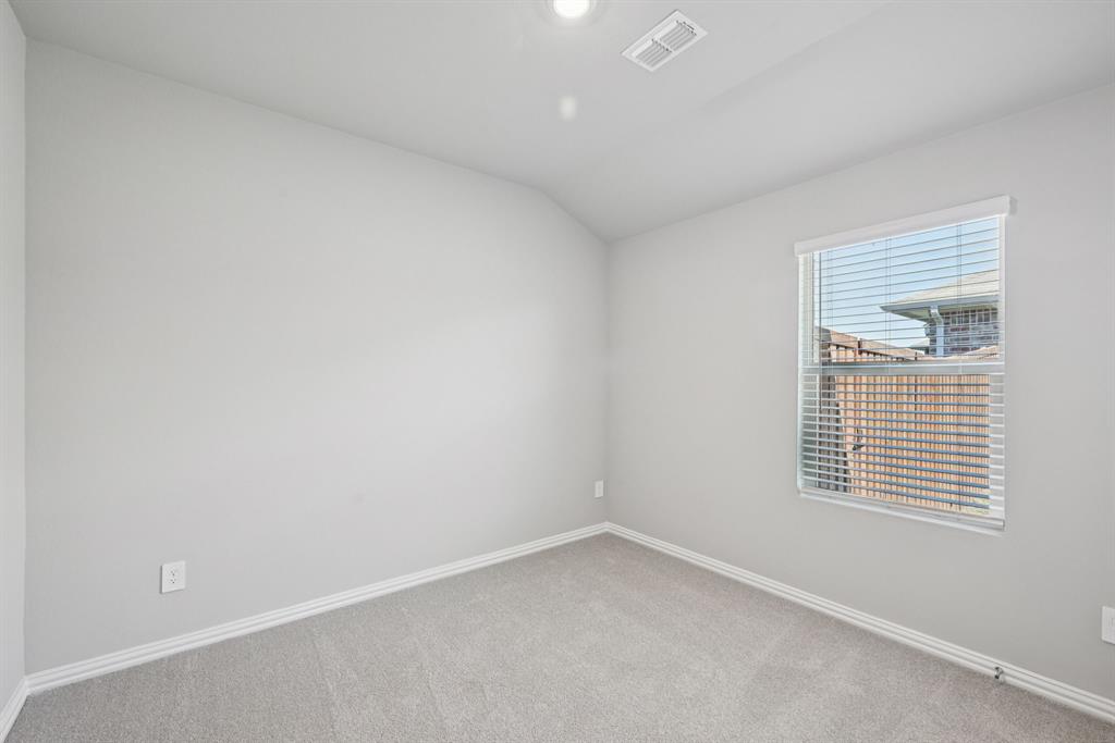 2112 Rannoch Street Sherman, TX 75092 - Photo 20 of 32 an empty room with a window