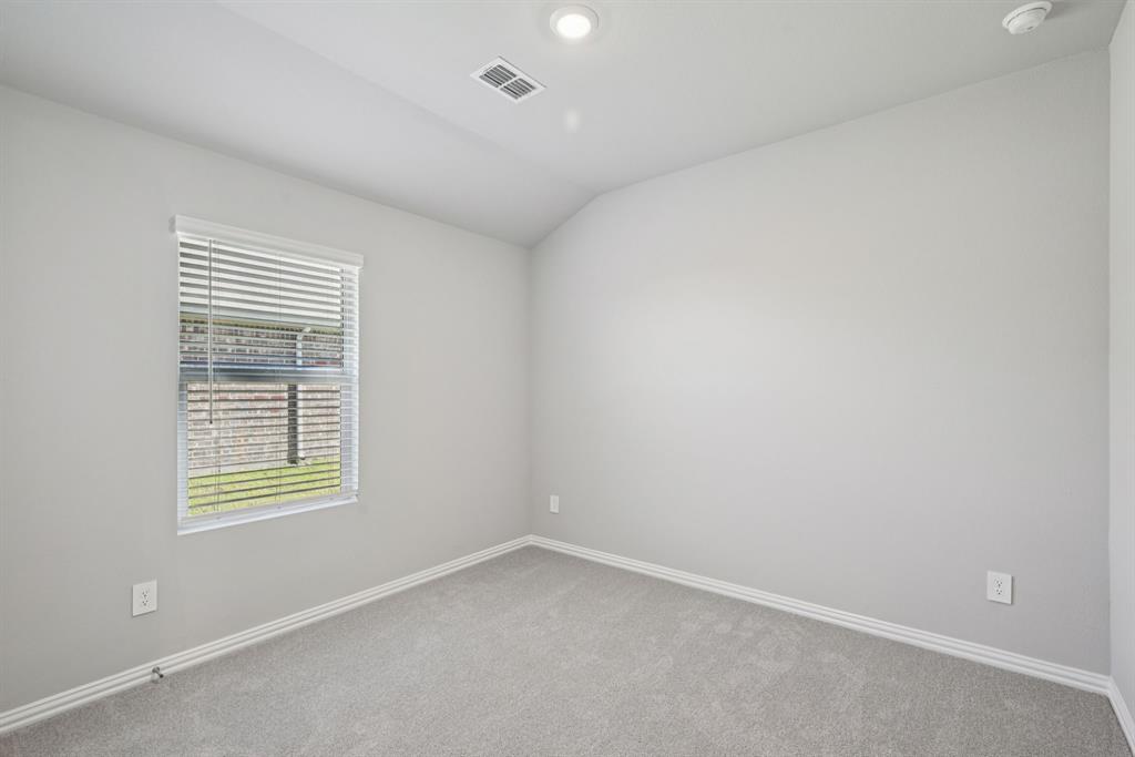 2112 Rannoch Street Sherman, TX 75092 - Photo 22 of 32 an empty room with a window