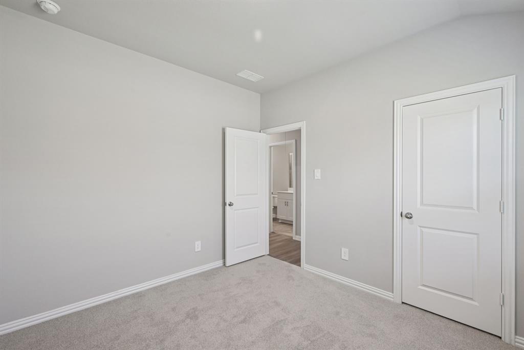 2112 Rannoch Street Sherman, TX 75092 - Photo 23 of 32 an empty room with closet area