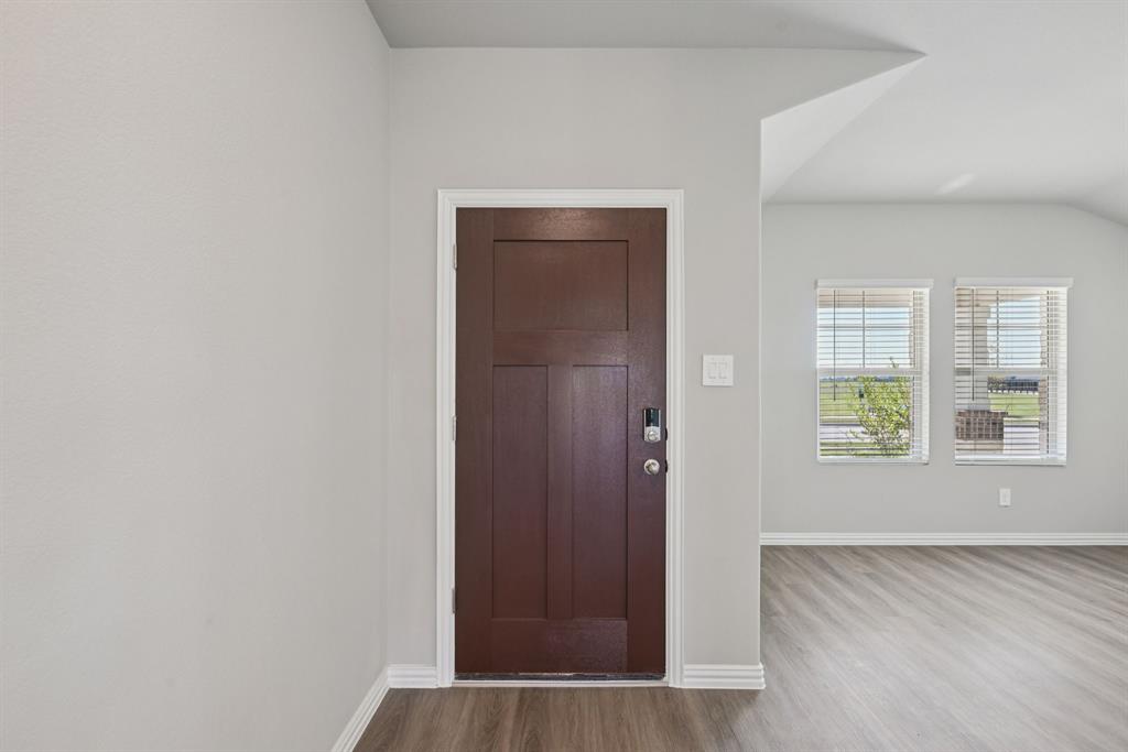 2112 Rannoch Street Sherman, TX 75092 - Photo 7 of 32 an empty room with windows and closet