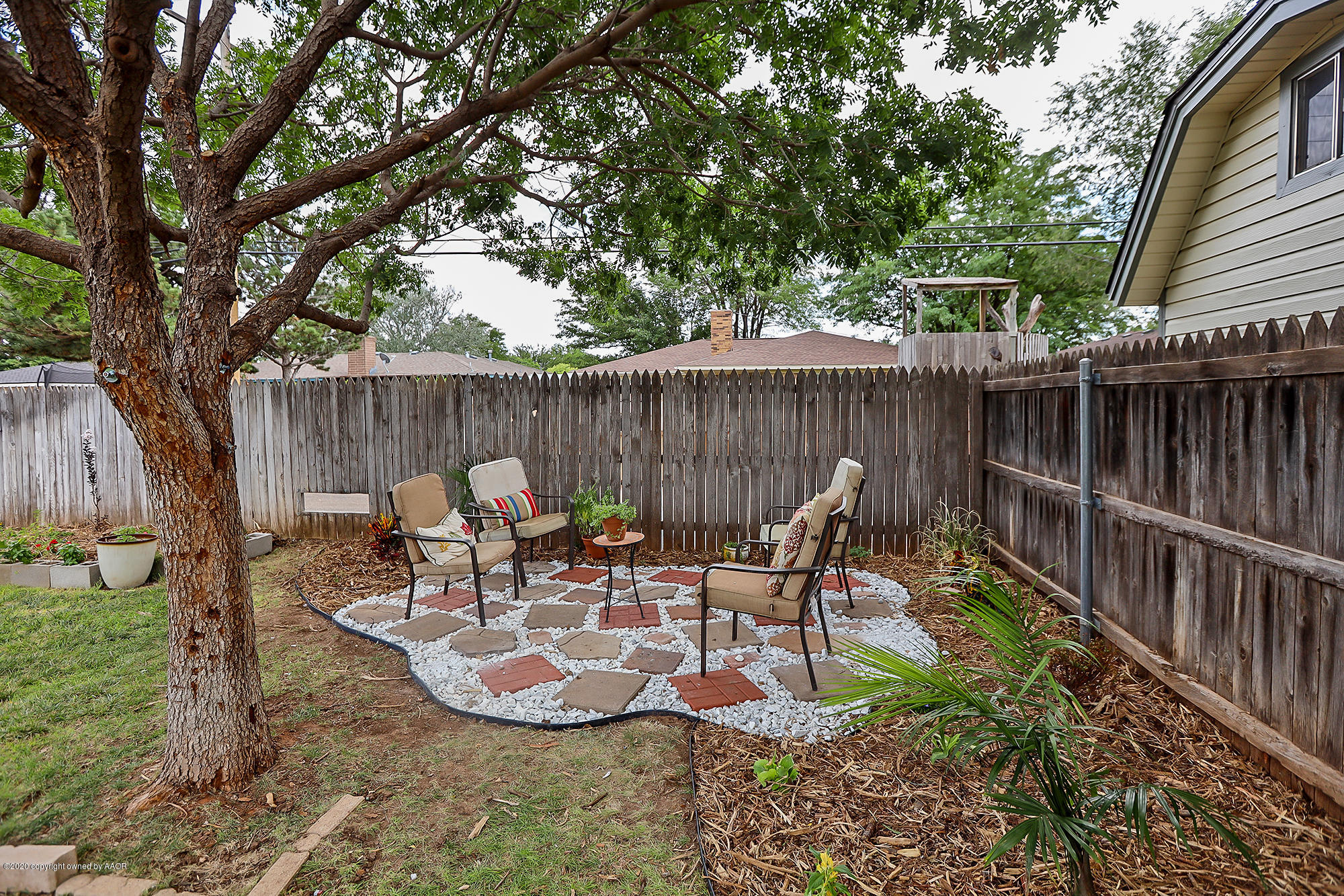 6701 Bayswater Road Amarillo, TX 79109 - Photo 24 of 27 Backyard Sitting Area