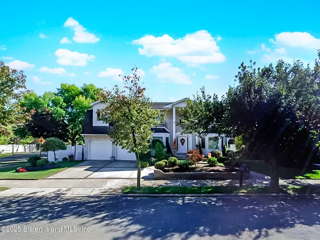 a view of a fire pit with a yard