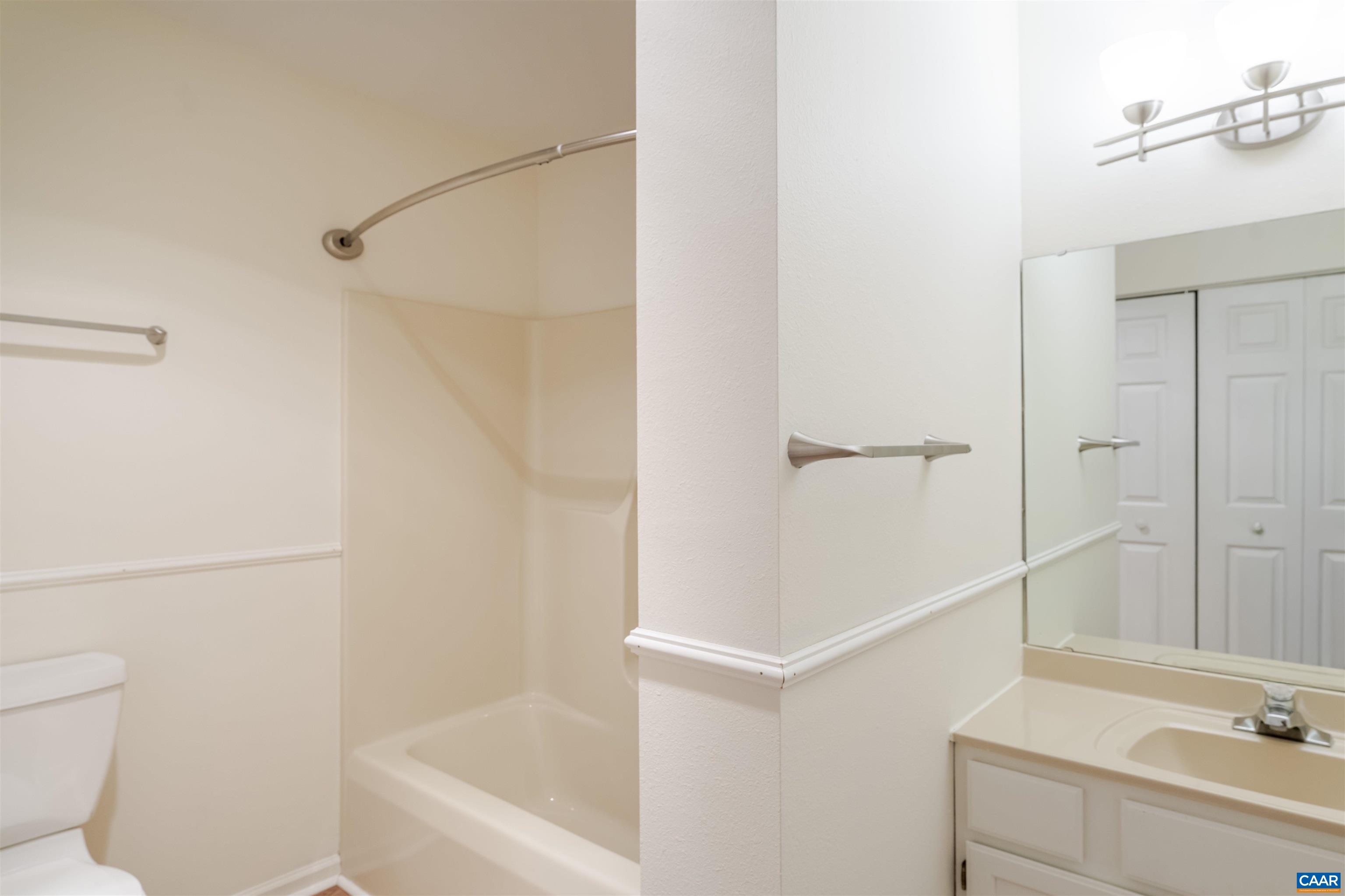 8 Hardwood Road Palmyra, VA 22963 - Photo 15 of 31 a bathroom with a bathtub and a sink