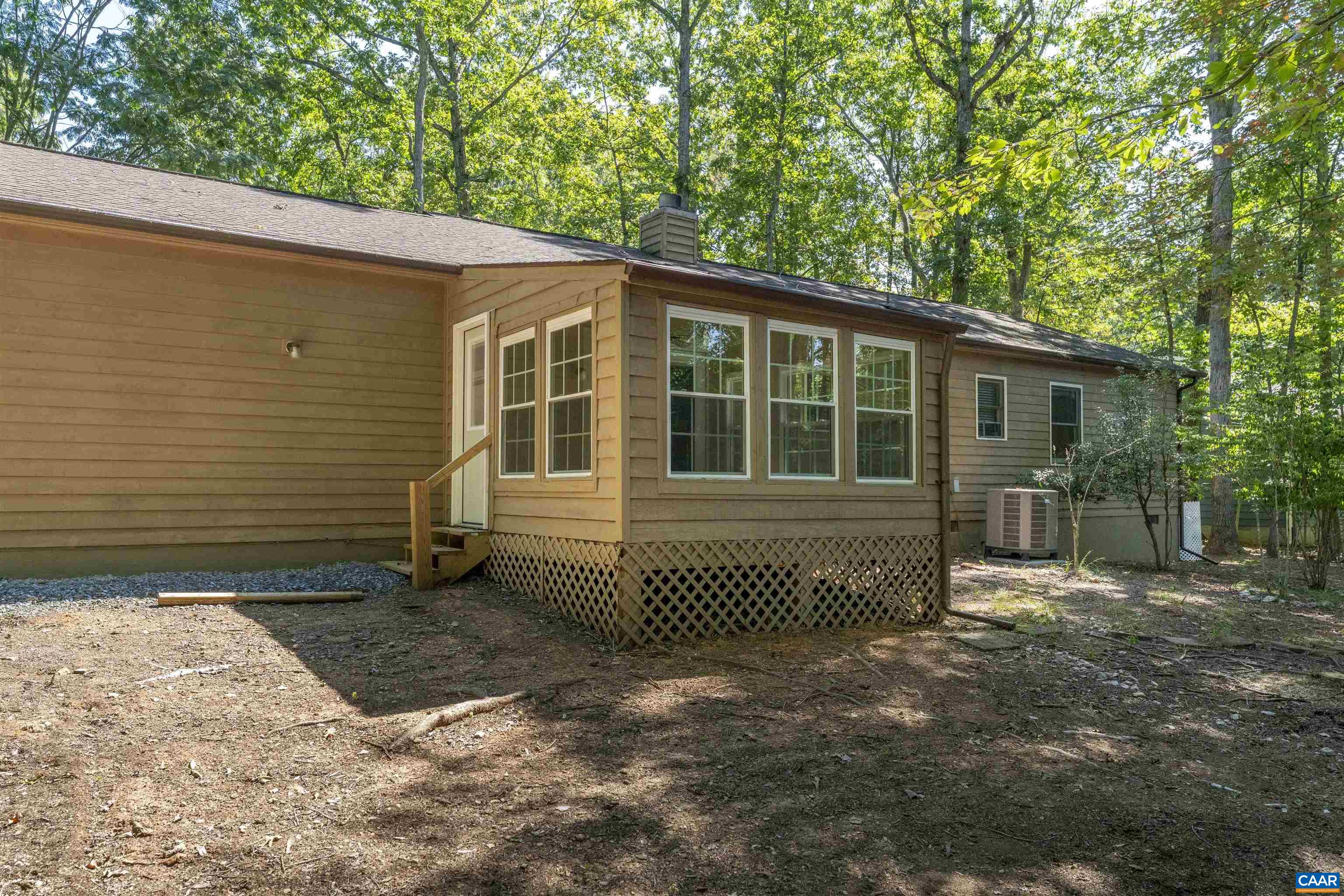 8 Hardwood Road Palmyra, VA 22963 - Photo 28 of 31 a front view of a house with a garden