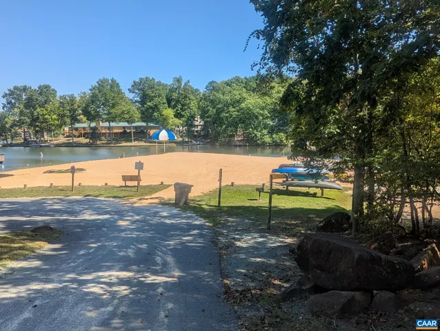 a view of a lake with a yard