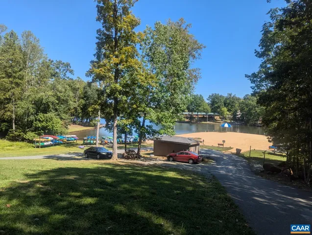 a view of a swimming pool with a patio