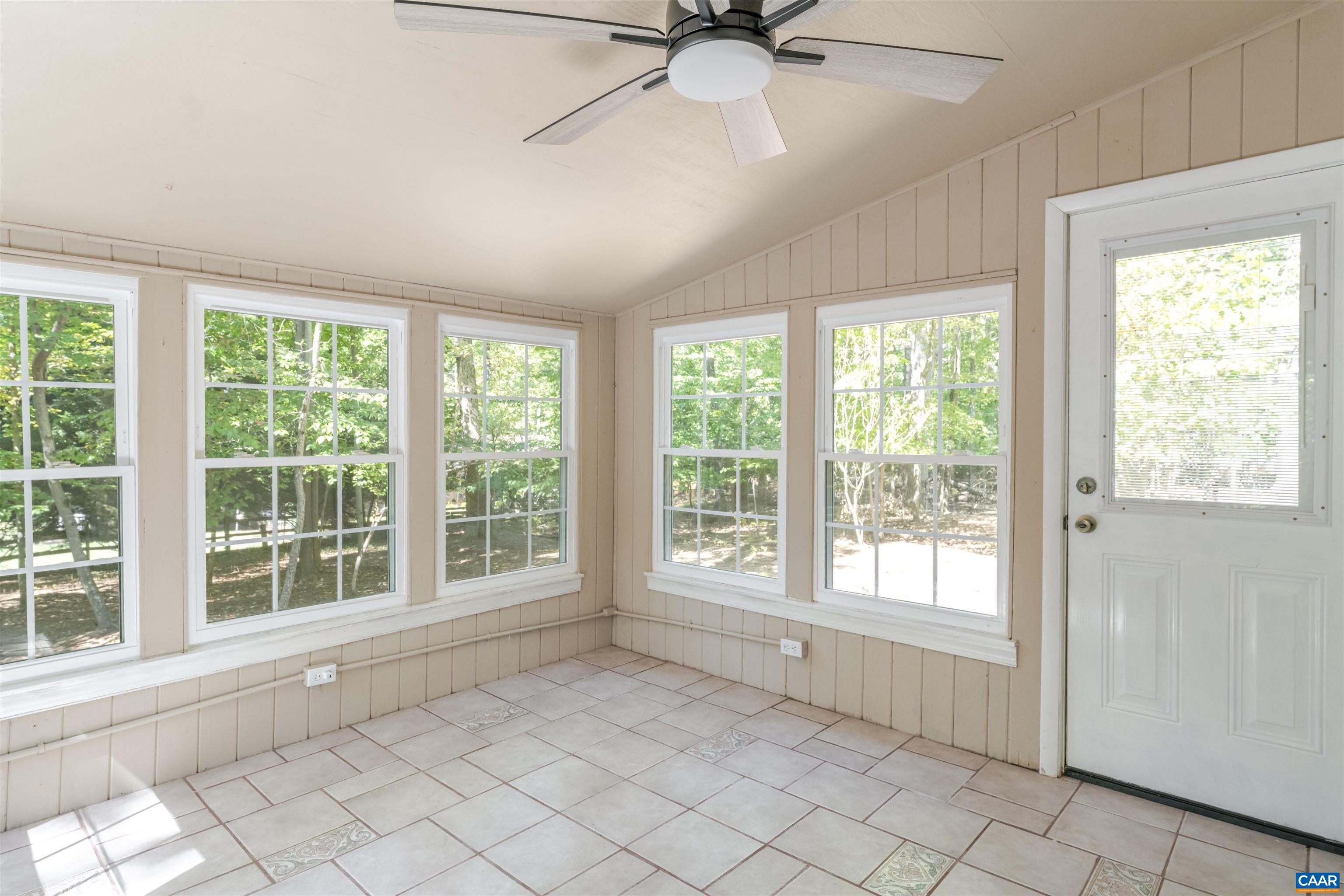 8 Hardwood Road Palmyra, VA 22963 - Photo 4 of 31 a view of an empty room with a window and a ceiling fan