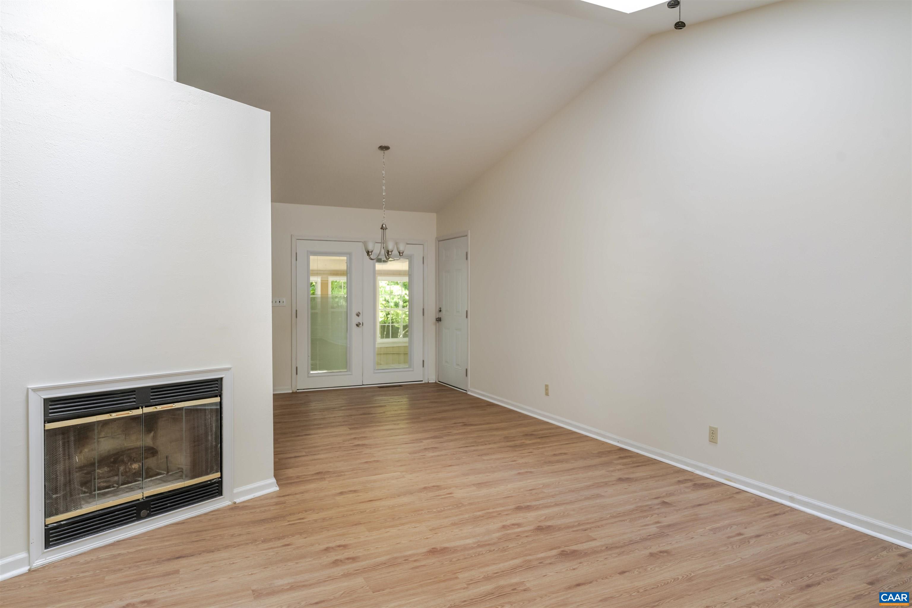 8 Hardwood Road Palmyra, VA 22963 - Photo 7 of 31 a view of an empty room with wooden floor and a window