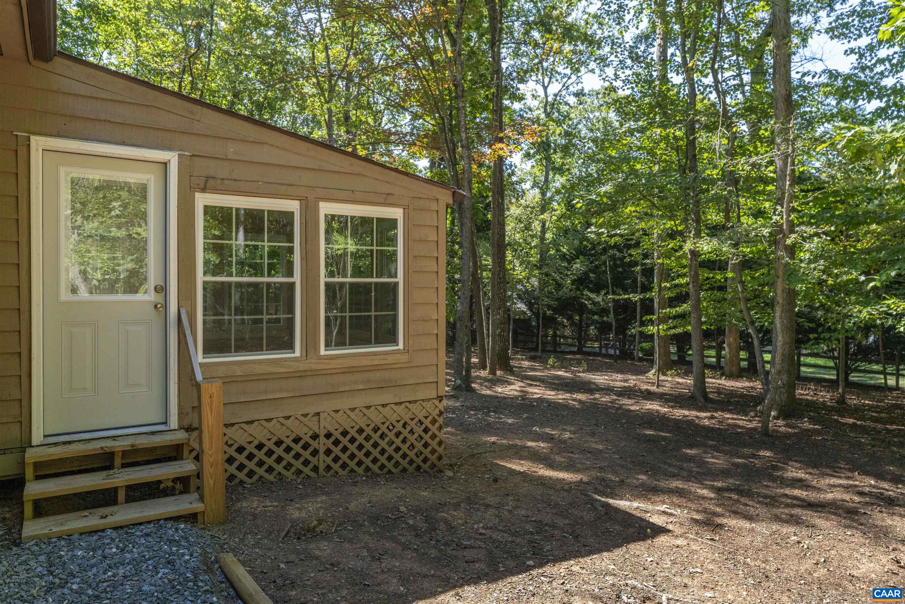 8 Hardwood Road Palmyra, VA 22963 - Photo 8 of 31 a front view of a house with a yard