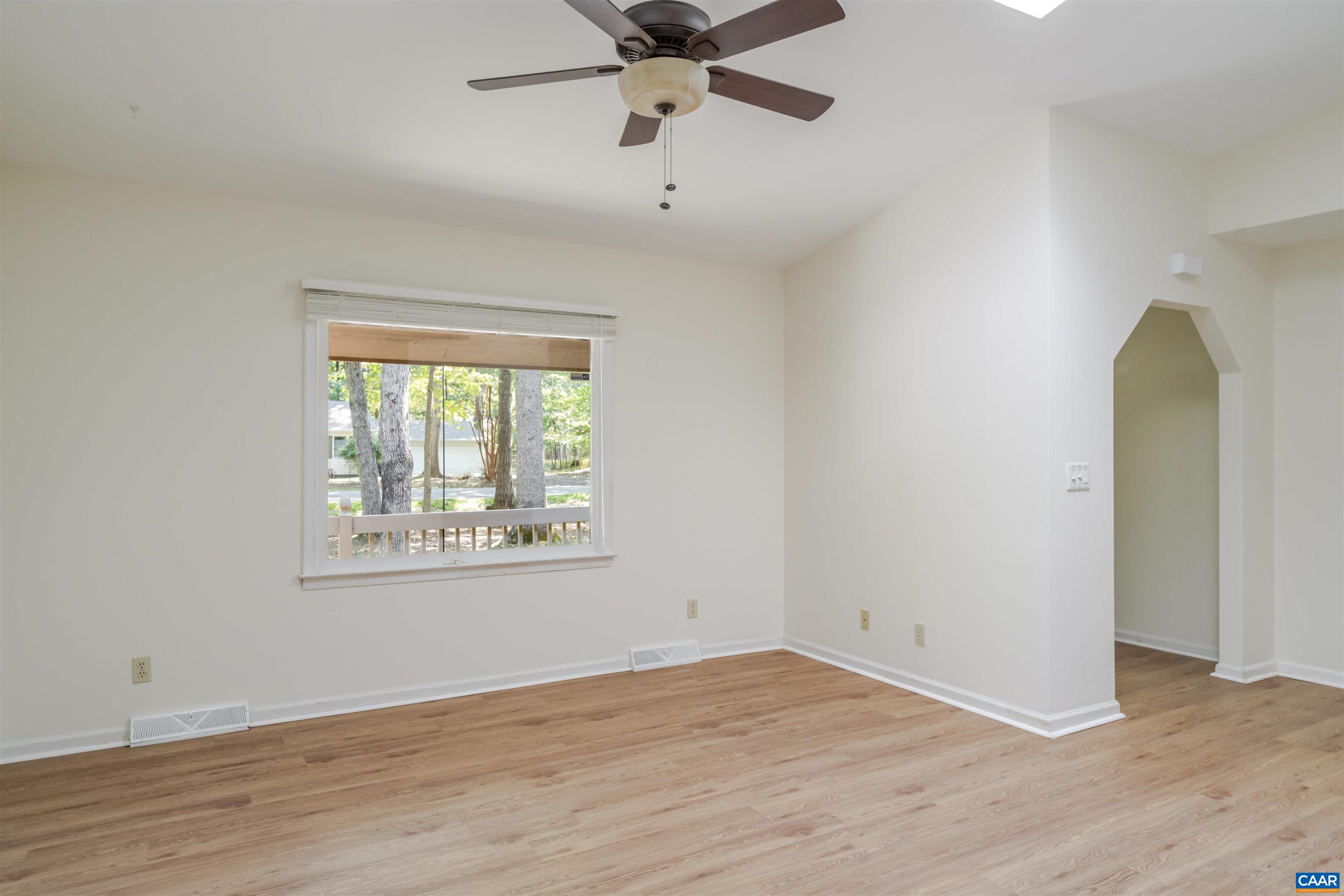 8 Hardwood Road Palmyra, VA 22963 - Photo 9 of 31 wooden floor in an empty room with a window