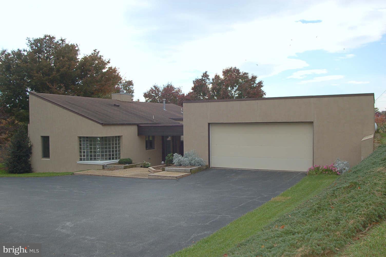 11110 Bennie Duncan Road Frederick, MD 21701 - Photo 16 of 30 Oversized 2 car garage w/built in cabinets