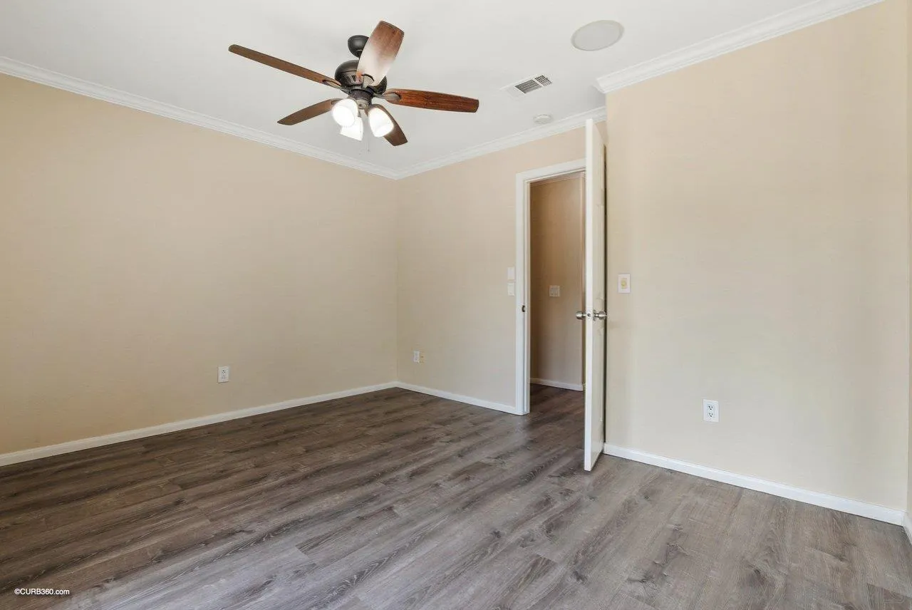 2648 Alpine Boulevard, Unit A Alpine, CA 91901 - Photo 18 of 30 a view of an empty room with wooden floor