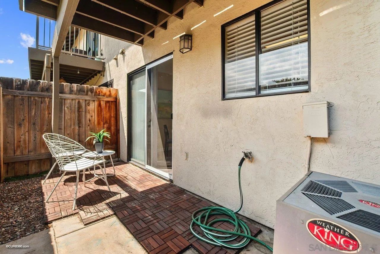 2648 Alpine Boulevard, Unit A Alpine, CA 91901 - Photo 24 of 30 a backyard of a house with table and chairs