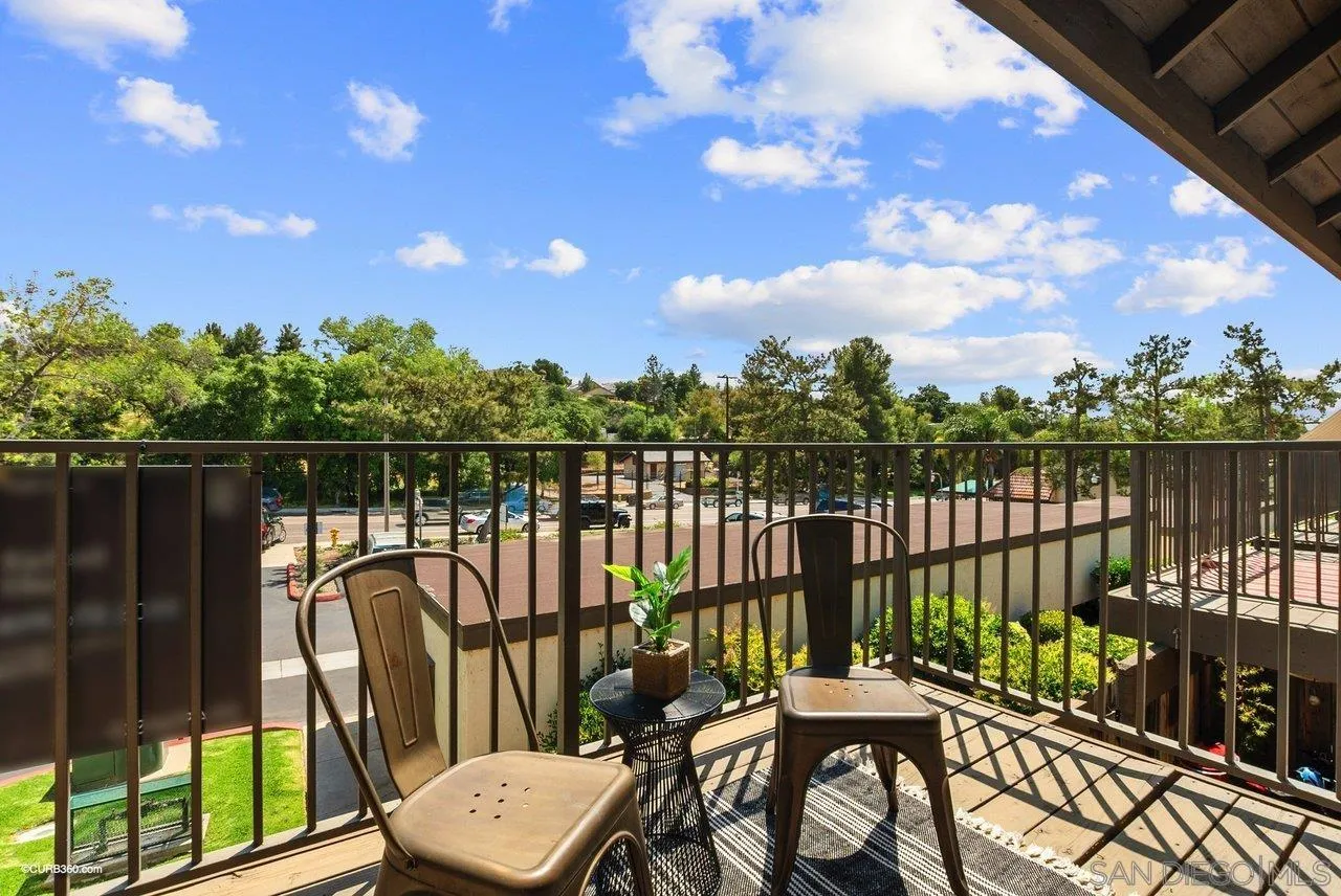 2648 Alpine Boulevard, Unit A Alpine, CA 91901 - Photo 26 of 30 a balcony with table and chairs