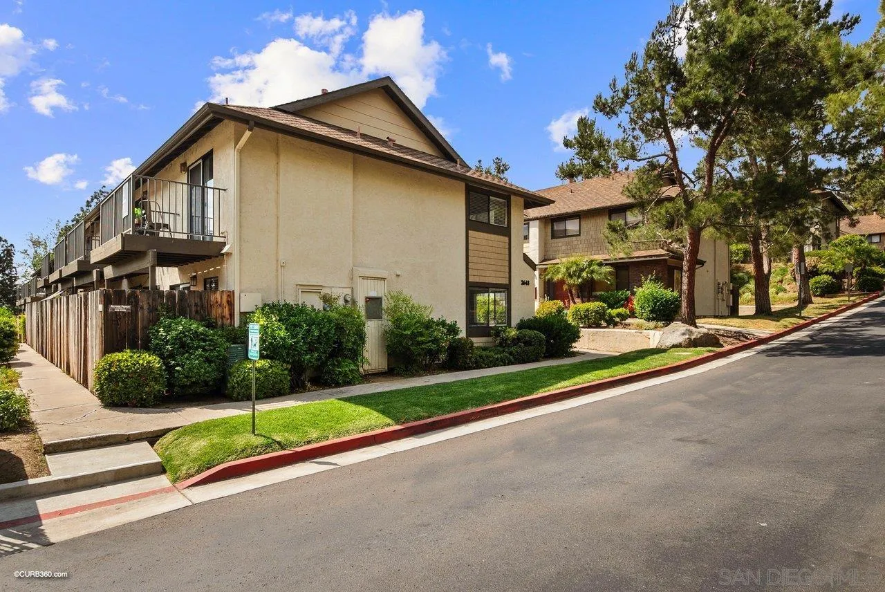 2648 Alpine Boulevard, Unit A Alpine, CA 91901 - Photo 3 of 30 a view of a house with a yard and porch