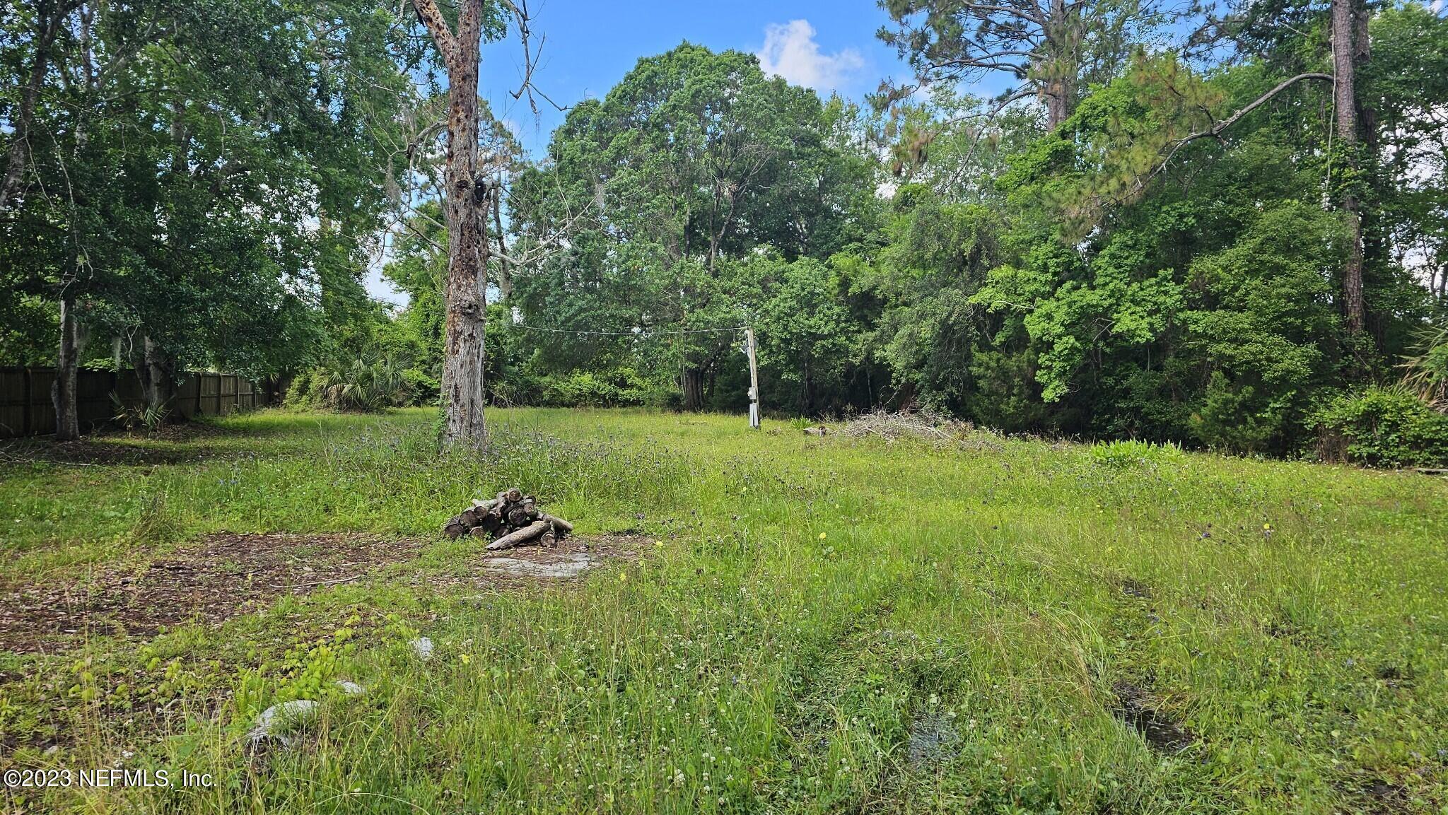 150 Venetian Boulevard St. Augustine, FL 32095 - Photo 13 of 17 a view of a park with large trees