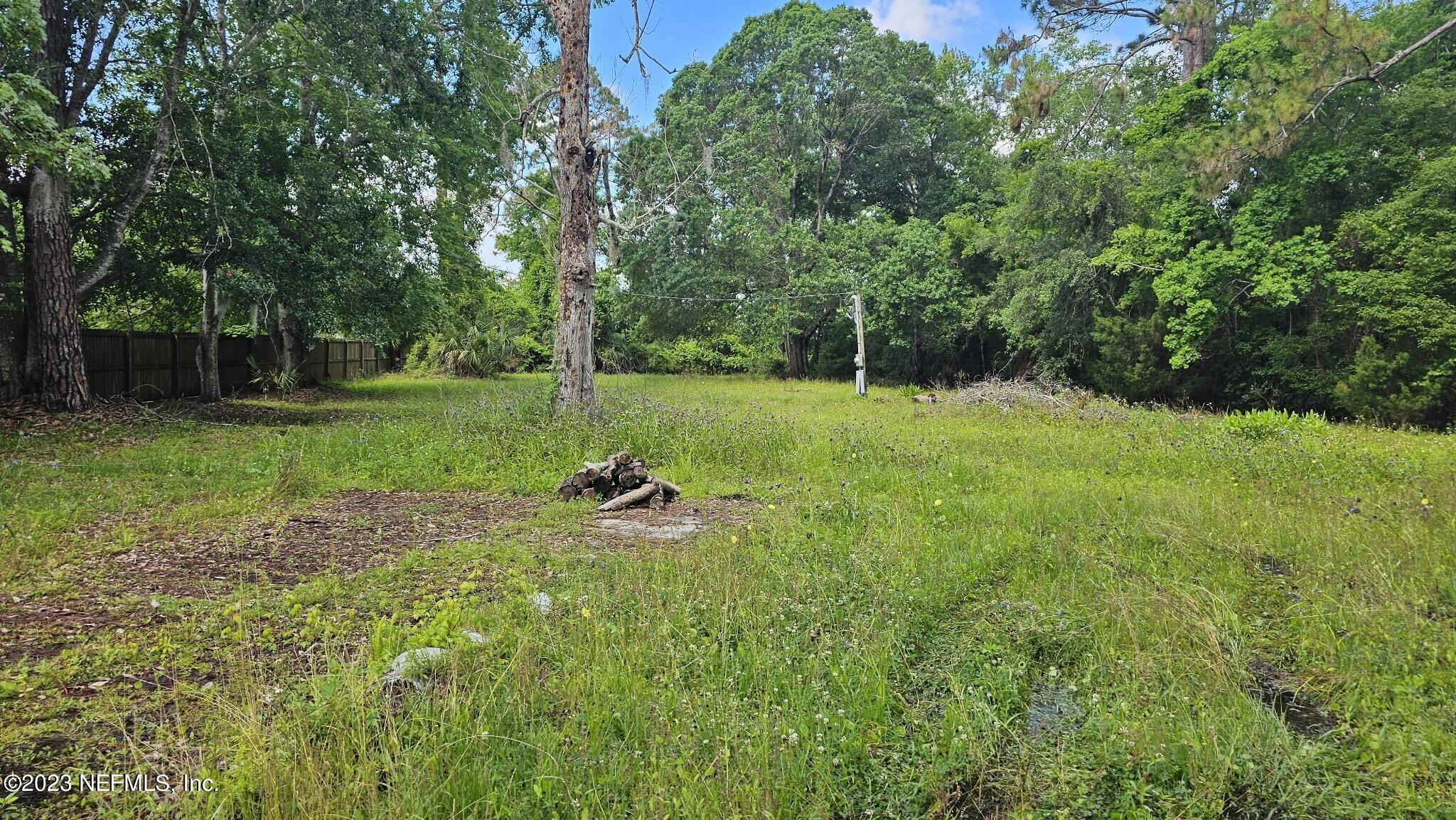 150 Venetian Boulevard St. Augustine, FL 32095 - Photo 15 of 17 a view of a park with large trees