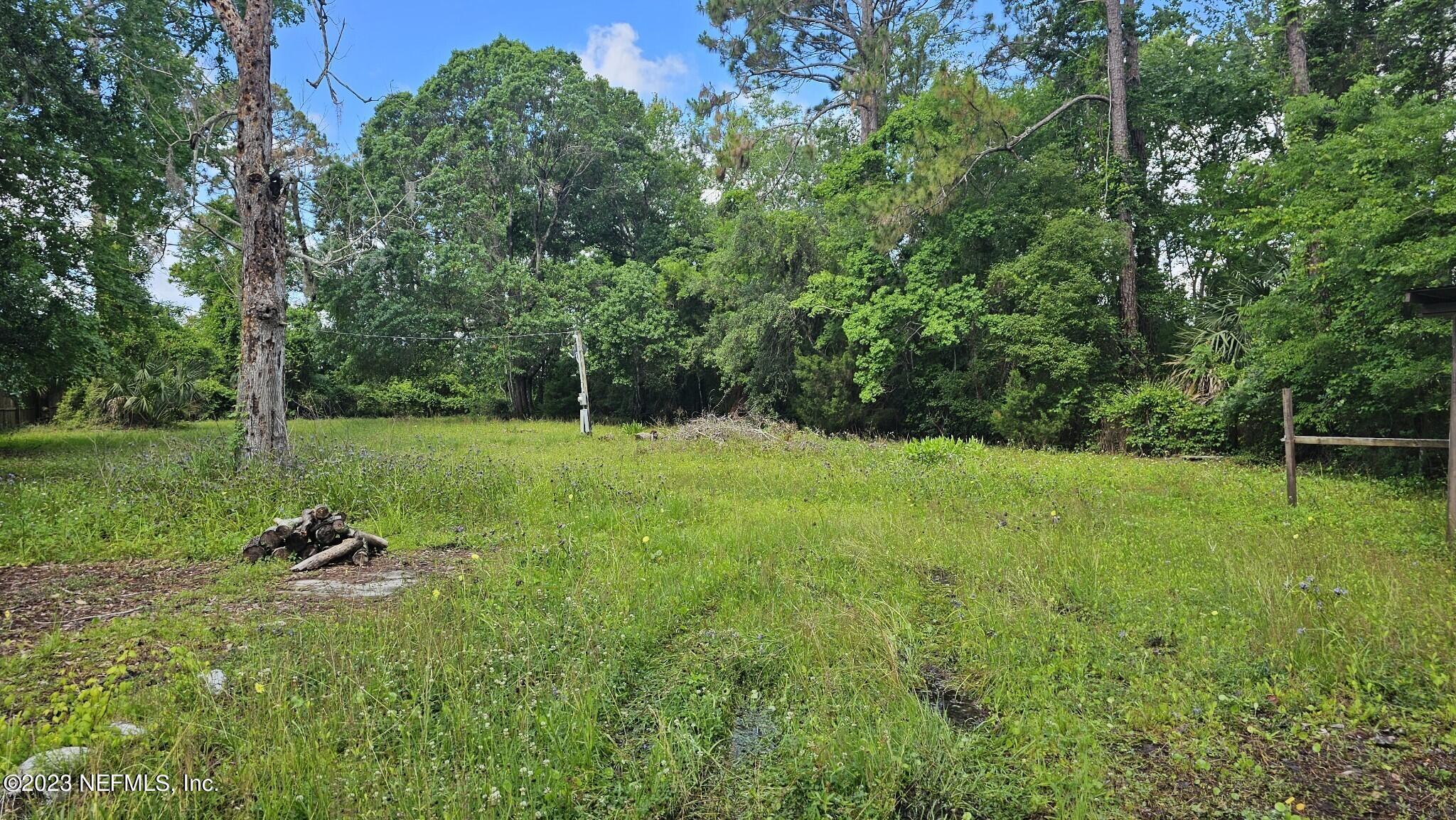 150 Venetian Boulevard St. Augustine, FL 32095 - Photo 17 of 17 a view of a park with large trees