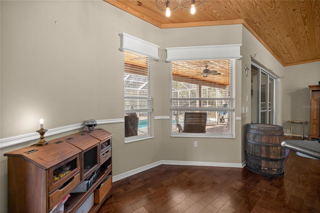 3030 South Bay Berry Point Inverness, FL 34450 - Photo 18 of 48 a view of a livingroom with furniture and windows