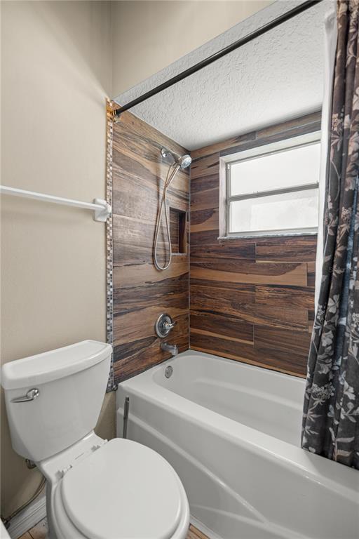 3030 South Bay Berry Point Inverness, FL 34450 - Photo 25 of 48 a bathroom with a toilet and a shower