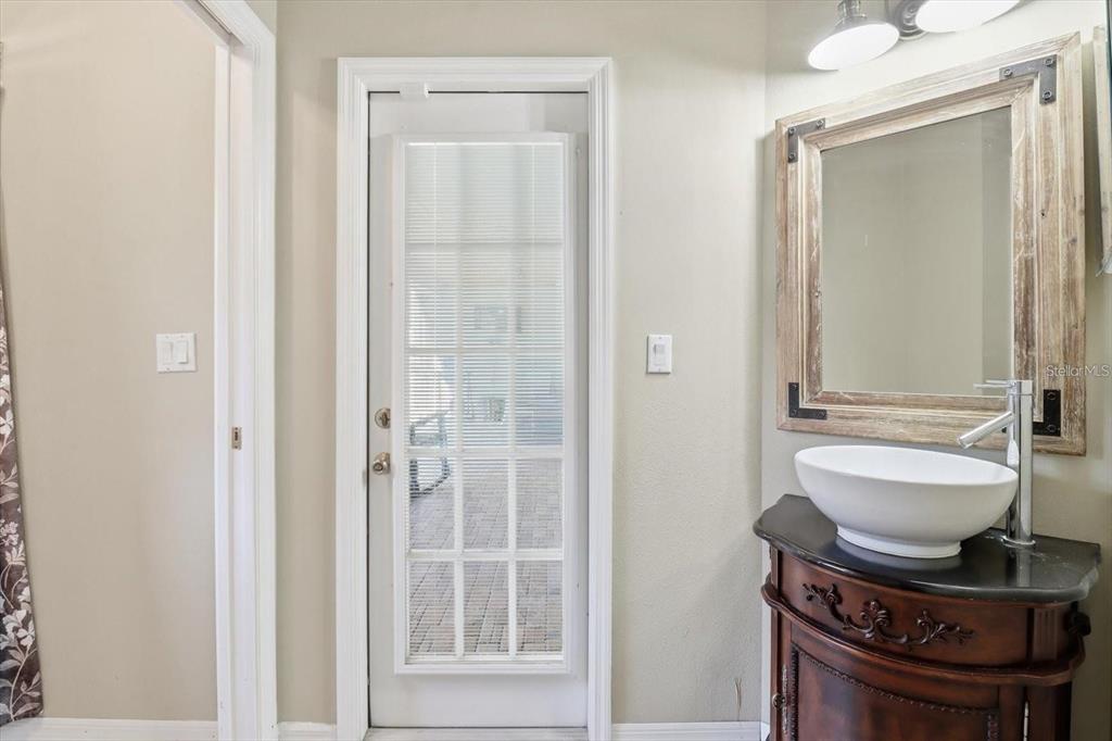 3030 South Bay Berry Point Inverness, FL 34450 - Photo 28 of 48 a bathroom with a toilet a sink and mirror