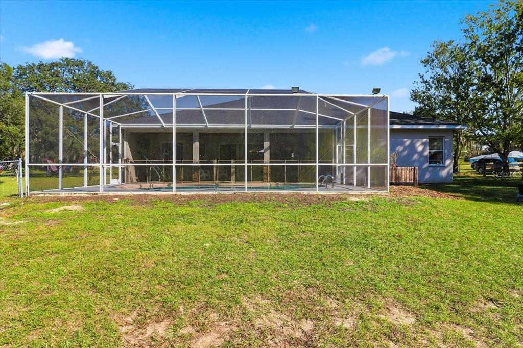 3030 South Bay Berry Point Inverness, FL 34450 - Photo 41 of 48 a view of a house with a yard and sitting area