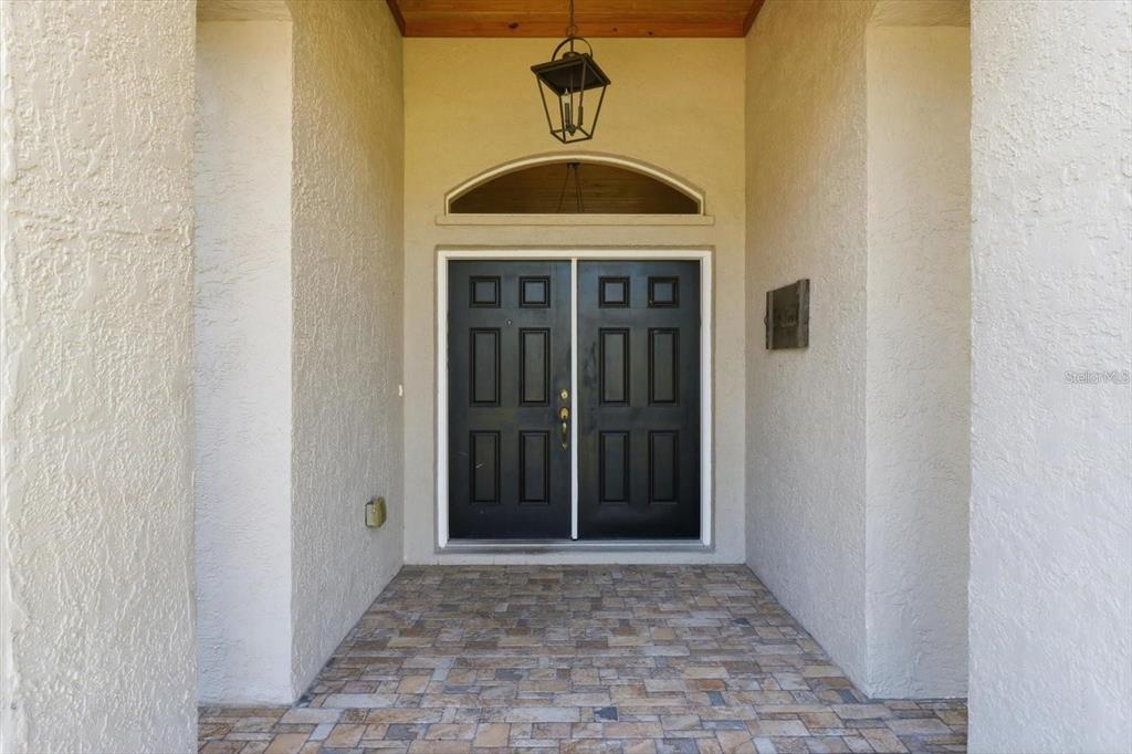 3030 South Bay Berry Point Inverness, FL 34450 - Photo 8 of 48 a view of a hallway with a door