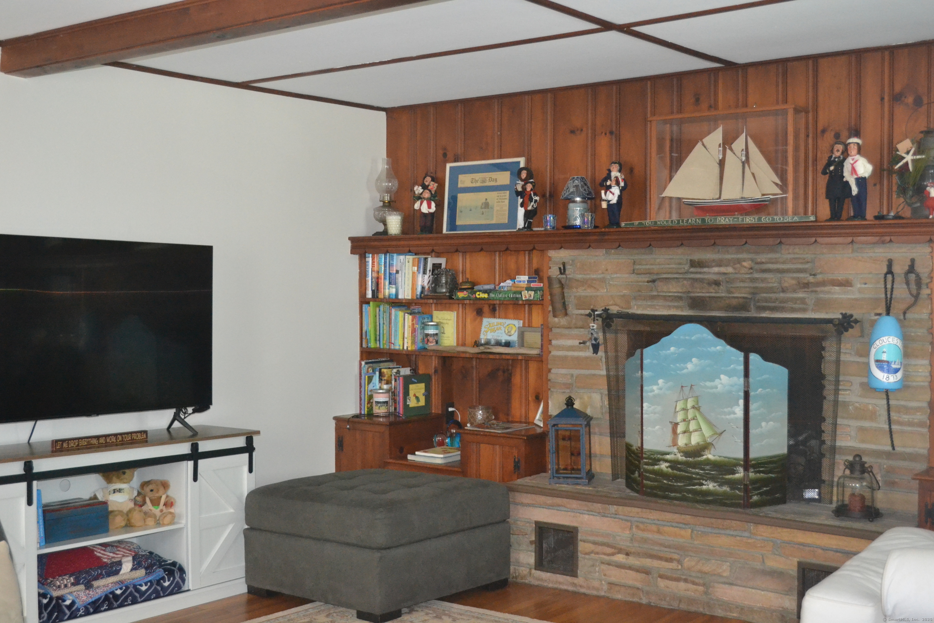 110 Columbus Avenue East Lyme, CT 06357 - Photo 15 of 24 a living room with furniture and a flat screen tv