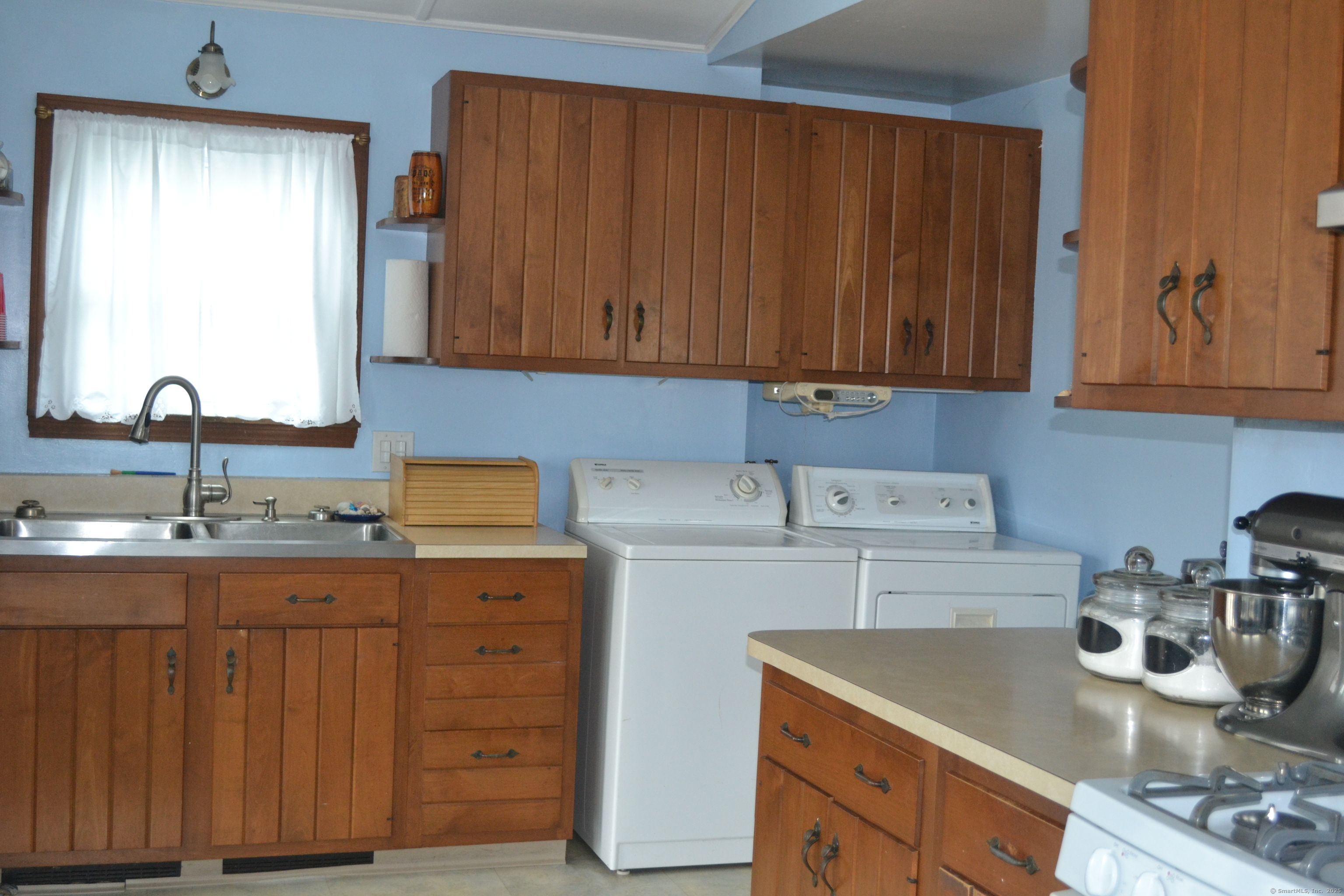 110 Columbus Avenue East Lyme, CT 06357 - Photo 5 of 24 a kitchen with sink and cabinets