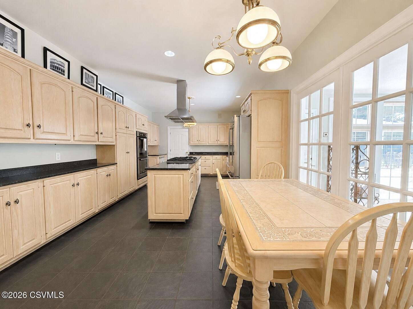 50 Sweet Gum Road Selinsgrove, PA 17870 - Photo 33 of 82 a kitchen that has a lot of white cabinets and stainless steel appliances
