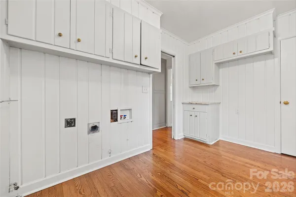 a view of kitchen with wooden floor