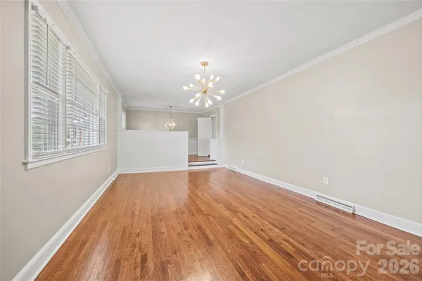 a view of livingroom with hardwood floor and window