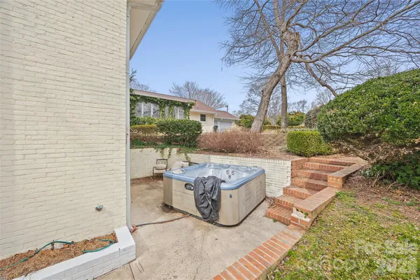 a house view with a garden space