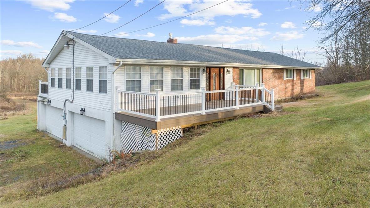 988 Hoch Road Danielsville, PA 18038 - Photo 28 of 29 A charming hillside residence with a spacious deck and convenient attached garage access.