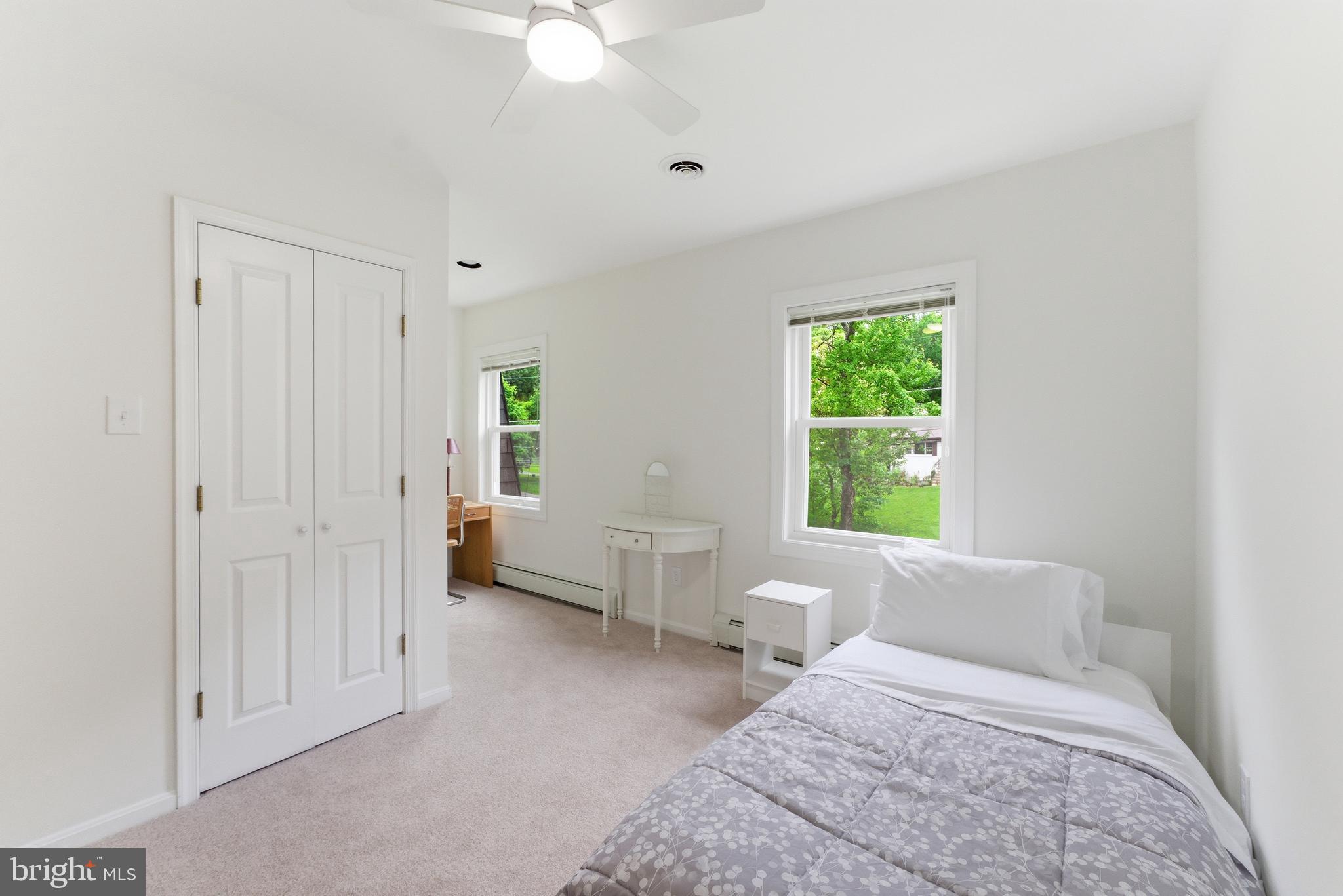 2100 Edgewater Parkway Silver Spring, MD 20903 - Photo 25 of 46 a bedroom with bed and window