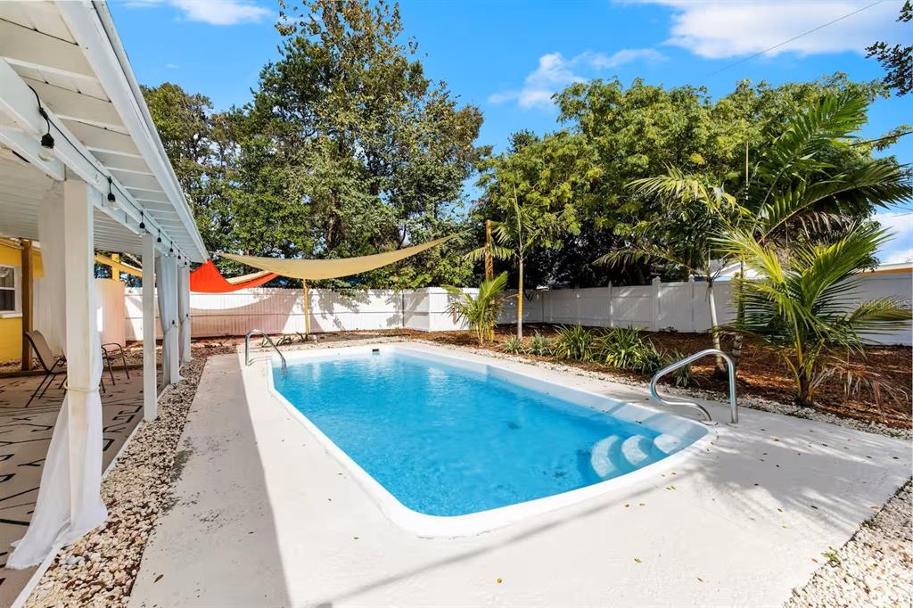 8215 Quail Road Seminole, FL 33777 - Photo 19 of 25 swimming pool view