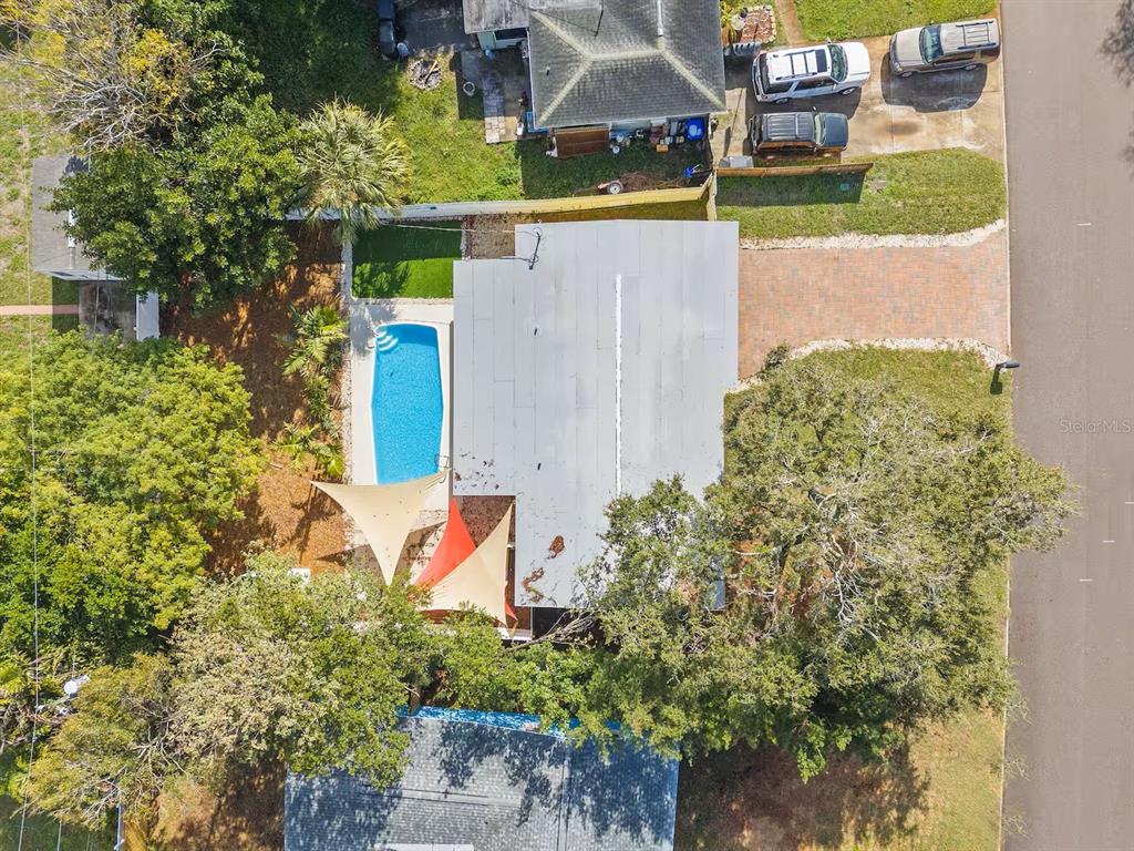 8215 Quail Road Seminole, FL 33777 - Photo 20 of 25 front view of a house with a yard