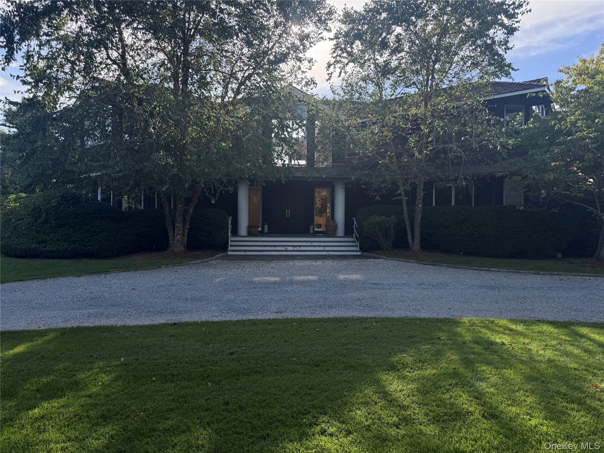 25 Ring Neck Road Remsenburg, NY 11960 - Photo 3 of 19 With very mature landscaping