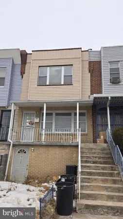 a front view of a house with balcony