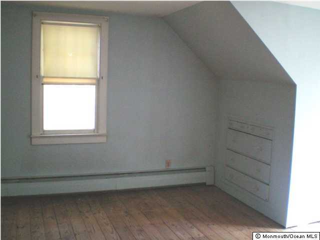 66 Butterfly Road Jackson, NJ 08527 - Photo 3 of 3 a view of a small space with wooden floor and a window