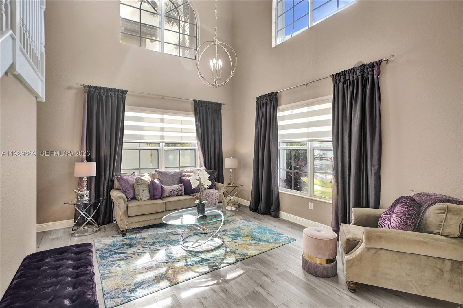 17713 Southwest 47th Street Miramar, FL 33029 - Photo 11 of 94 a living room with furniture and a large window