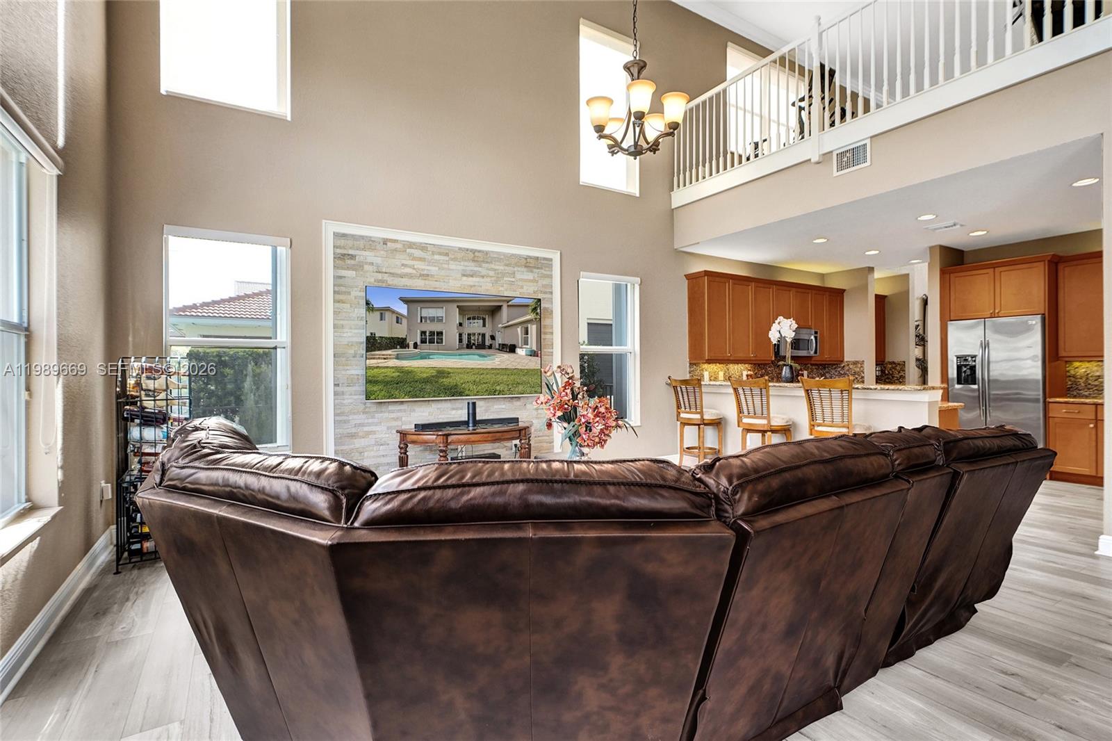 17713 Southwest 47th Street Miramar, FL 33029 - Photo 12 of 94 a living room with furniture and a large window