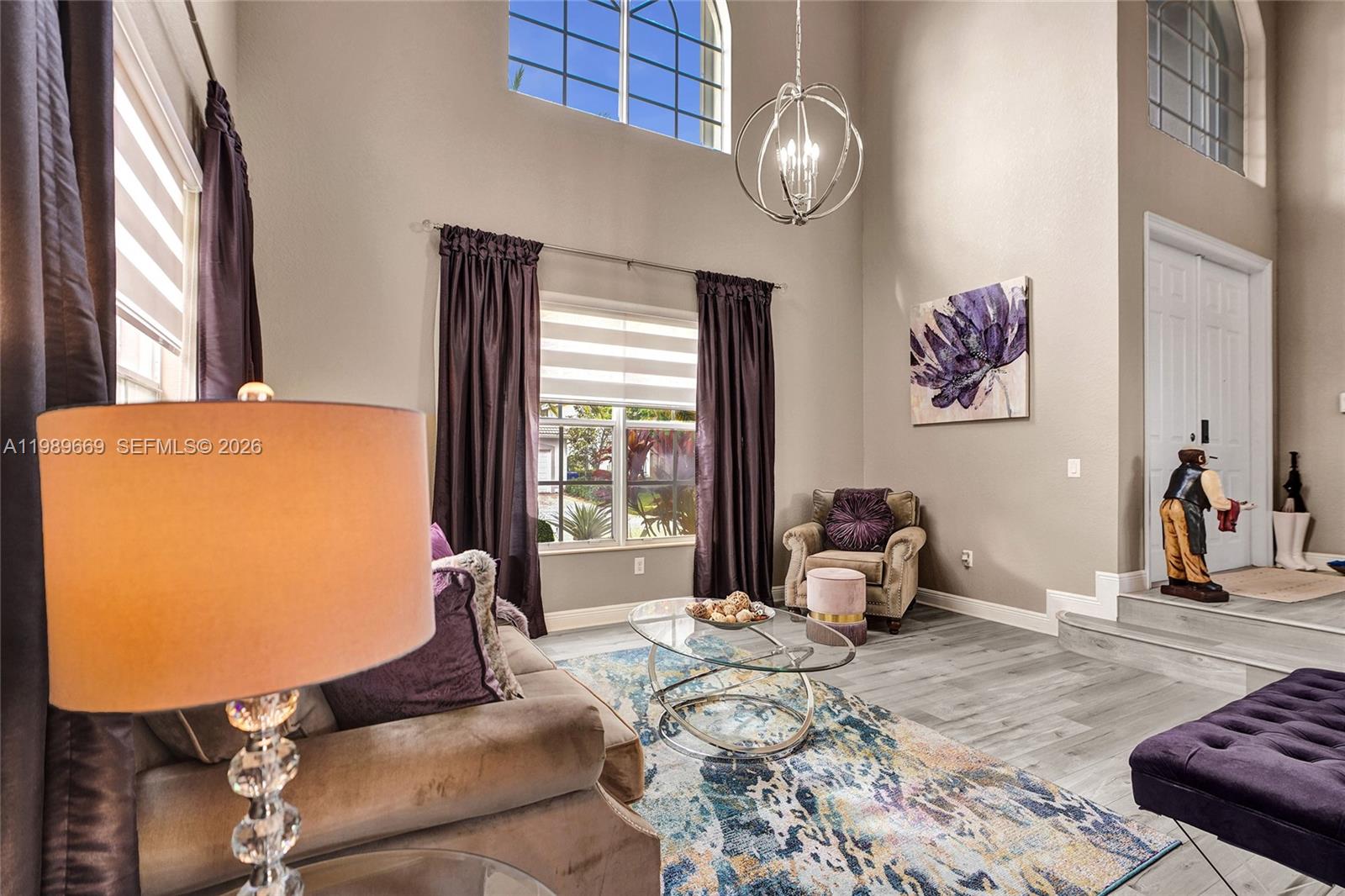 17713 Southwest 47th Street Miramar, FL 33029 - Photo 21 of 94 a bedroom with a bed and glass window
