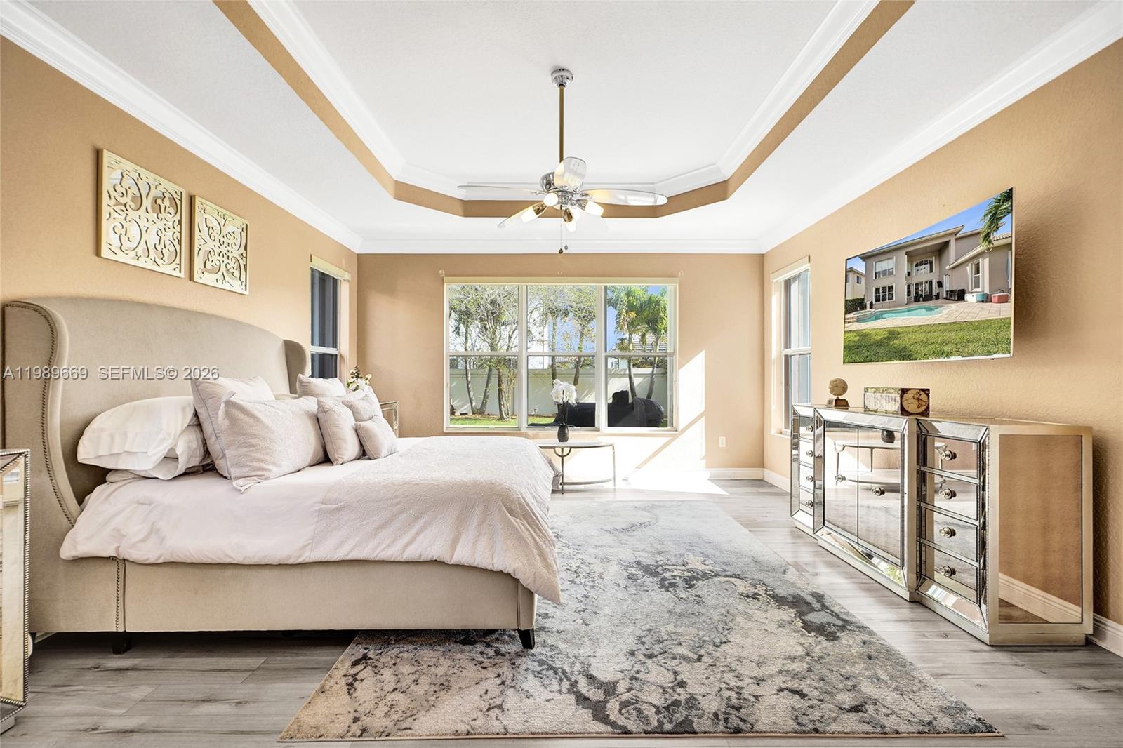 17713 Southwest 47th Street Miramar, FL 33029 - Photo 37 of 94 a bedroom with a large bed couch and a window
