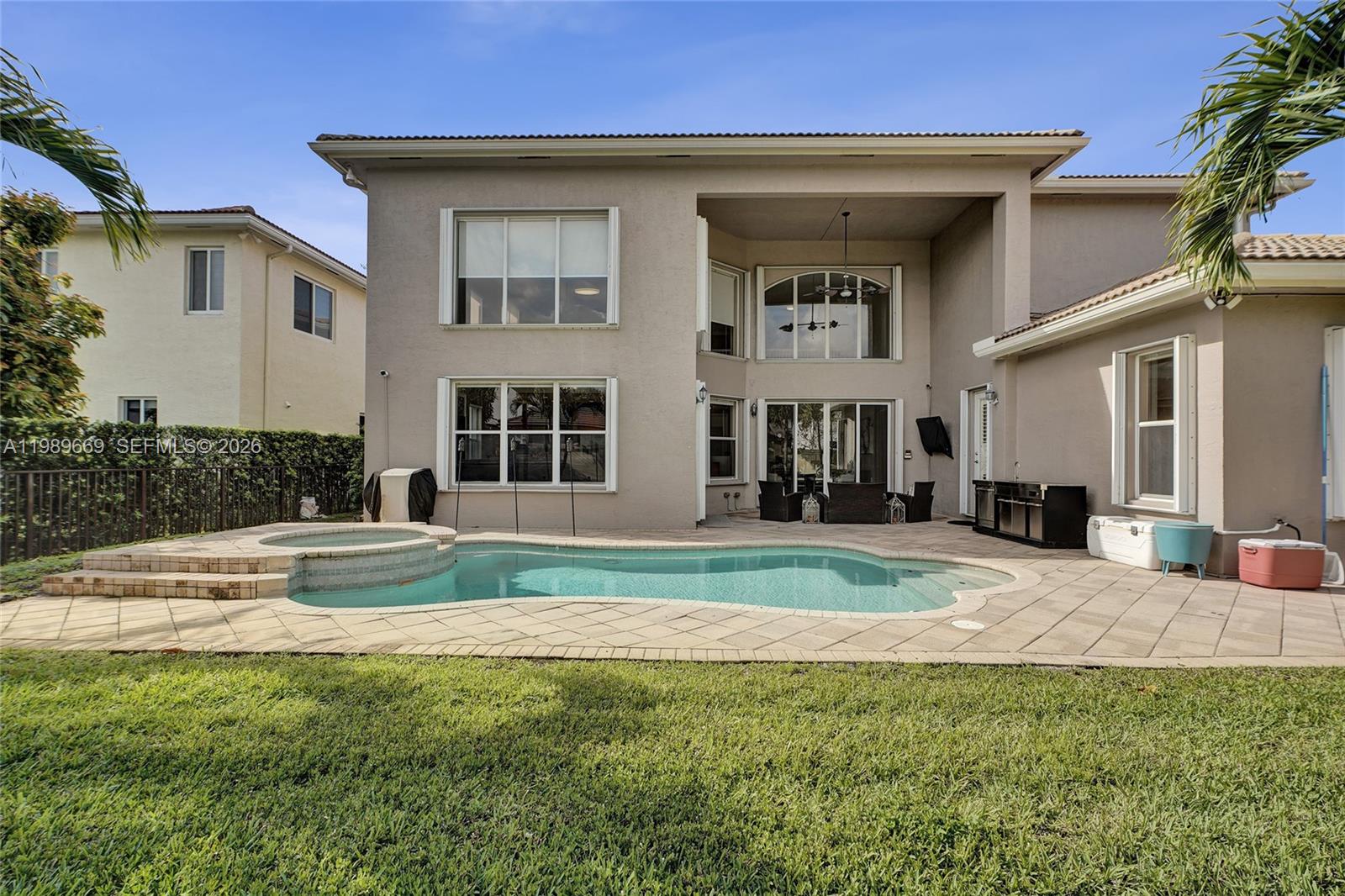 17713 Southwest 47th Street Miramar, FL 33029 - Photo 5 of 94 a front view of a house with a yard