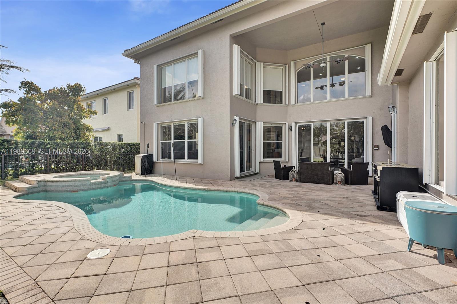 17713 Southwest 47th Street Miramar, FL 33029 - Photo 57 of 94 a view of a house with backyard and sitting area