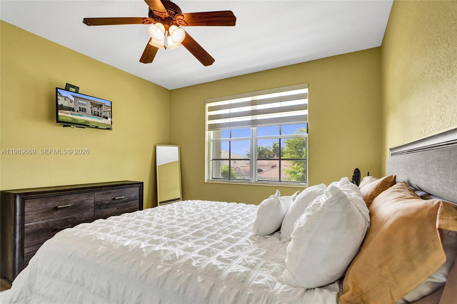 17713 Southwest 47th Street Miramar, FL 33029 - Photo 58 of 94 a bedroom with a bed and a dresser