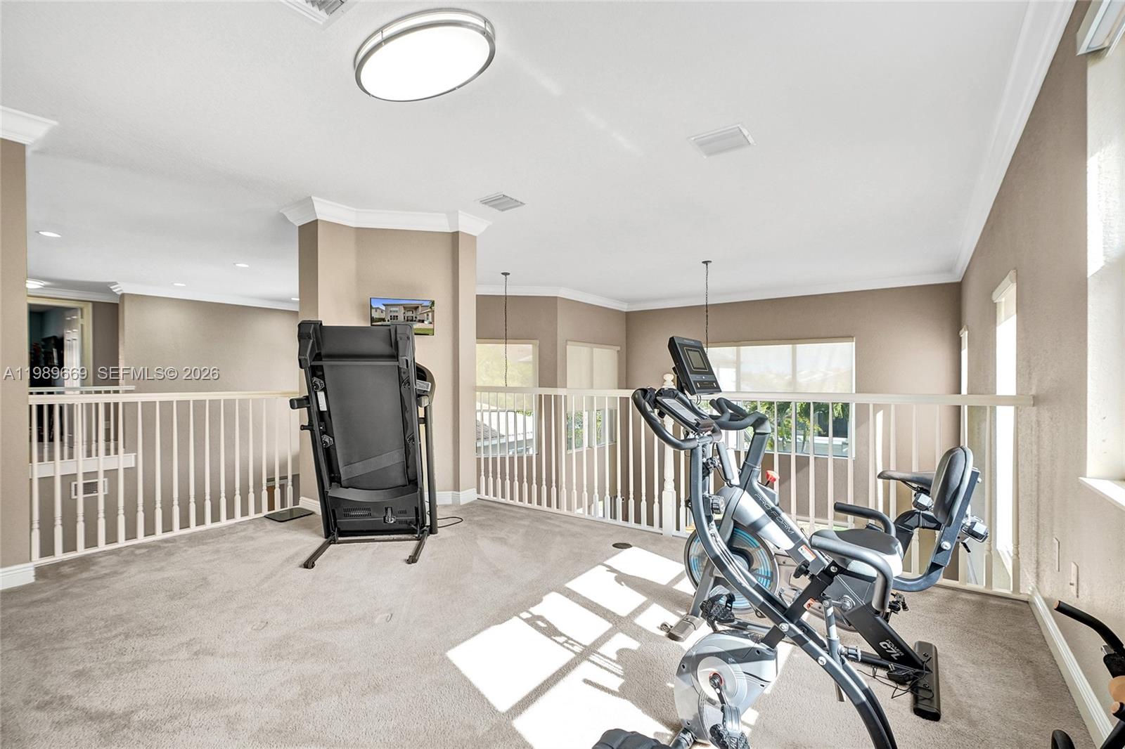 17713 Southwest 47th Street Miramar, FL 33029 - Photo 67 of 94 a view of a room with gym equipment