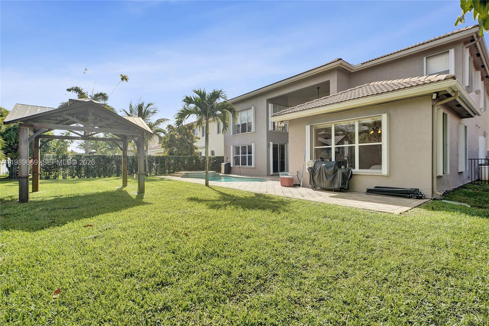 17713 Southwest 47th Street Miramar, FL 33029 - Photo 84 of 94 a view of a house with a yard